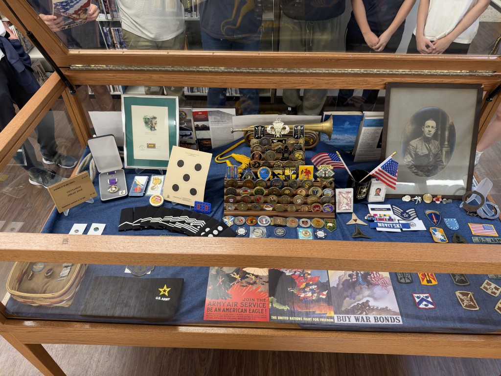 Military Engagement Committee display at South County Regional Library October 2026 installed by Estero High School JROTC